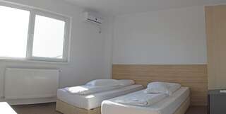 Мотели Motel Alexander Olteniţa Двухместный номер с 2 отдельными кроватями и собственной ванной комнатой-1